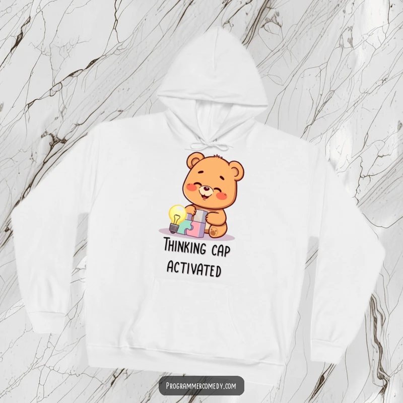 Funny bear cub character focused on solving a complex puzzle, lightbulb shining, printed on a cozy hoodie, ideal for a funny gift for smart people.